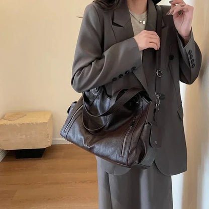 Leonie™ - Läderhandväska